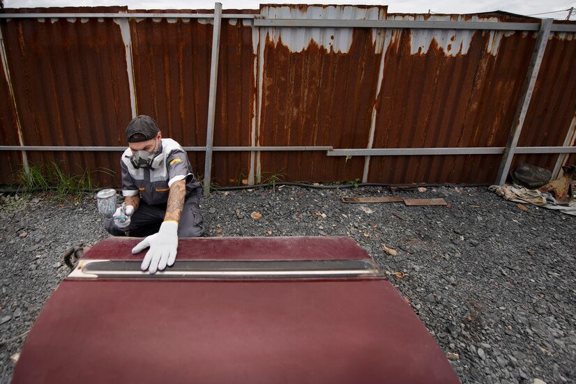 man-working-outdoors-high-angle_23-2149714277 man-working-outdoors-high-angle_23-2149714277
